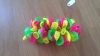 green pink and yellow balloon bow